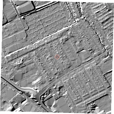 Shaded relief map of the ground around E107NP, computed from Environment Agency LiDAR. The ground here sits at about 6 m above sea level and falls 8 m across the surrounding 800 m. Surface water reaching this point runs off ground lying to the east, 1.2 m higher.