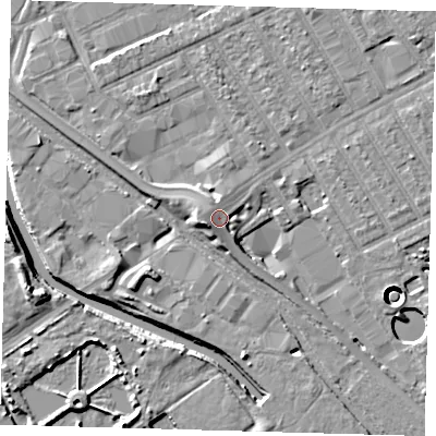 Shaded relief map of the ground around E107NS, computed from Environment Agency LiDAR. The ground here sits at about 9 m above sea level and falls 11 m across the surrounding 800 m. Surface water reaching this point runs off ground lying to the west-south-west, 2.5 m higher.