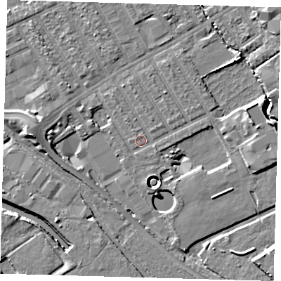 Shaded relief map of the ground around E107PD, computed from Environment Agency LiDAR. The ground here sits at about 6 m above sea level and falls 11 m across the surrounding 800 m. Surface water reaching this point runs off ground lying to the east-south-east, 0.8 m higher.