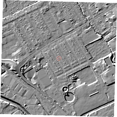 Shaded relief map of the ground around E107PE, computed from Environment Agency LiDAR. The ground here sits at about 7 m above sea level and falls 11 m across the surrounding 800 m. Surface water reaching this point runs off ground lying to the south-east, 1.0 m higher.
