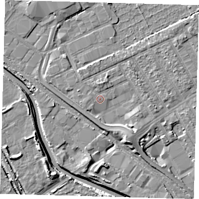 Shaded relief map of the ground around E107PG, computed from Environment Agency LiDAR. The ground here sits at about 7 m above sea level and falls 8 m across the surrounding 800 m. Surface water reaching this point runs off ground lying to the north, 1.0 m higher.