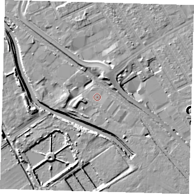 Shaded relief map of the ground around E107QT, computed from Environment Agency LiDAR. The ground here sits at about 7 m above sea level and falls 11 m across the surrounding 800 m. Surface water reaching this point runs off ground lying to the south-east, 0.5 m higher.