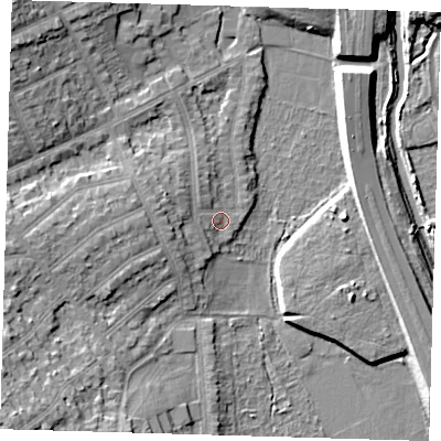 Shaded relief map of the ground around E112BY, computed from Environment Agency LiDAR. The ground here sits at about 11 m above sea level and falls 14 m across the surrounding 800 m. Surface water reaching this point runs off ground lying to the west-north-west, 4.2 m higher.