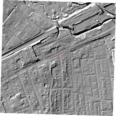 Shaded relief map of the ground around E125JP, computed from Environment Agency LiDAR. The ground here sits at about 7 m above sea level and falls 10 m across the surrounding 800 m. Surface water reaching this point runs off ground lying to the west, 5.3 m higher.
