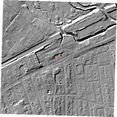 Shaded relief map of the ground around E125JR, computed from Environment Agency LiDAR. The ground here sits at about 7 m above sea level and falls 10 m across the surrounding 800 m. Surface water reaching this point runs off ground lying to the west, 5.1 m higher.