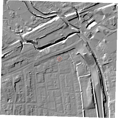 Shaded relief map of the ground around E125NS, computed from Environment Agency LiDAR. The ground here sits at about 4 m above sea level and falls 11 m across the surrounding 800 m. Surface water reaching this point runs off ground lying to the west, 7.9 m higher.