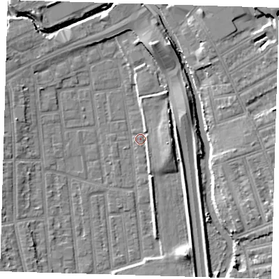 Shaded relief map of the ground around E125NX, computed from Environment Agency LiDAR. The ground here sits at about 4 m above sea level and falls 9 m across the surrounding 800 m. Surface water reaching this point runs off ground lying to the north-east, 5.2 m higher.