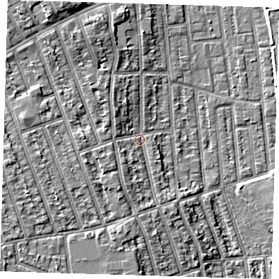 Shaded relief map of the ground around E125PG, computed from Environment Agency LiDAR. The ground here sits at about 6 m above sea level and falls 9 m across the surrounding 800 m. Surface water reaching this point runs off ground lying to the west, 5.5 m higher.