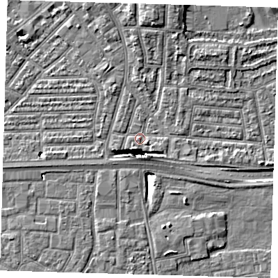 Shaded relief map of the ground around E138LT, computed from Environment Agency LiDAR. The ground here sits at about 2 m above sea level and falls 11 m across the surrounding 800 m. Surface water reaching this point runs off ground lying to the east-south-east, 1.6 m higher.