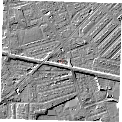 Shaded relief map of the ground around E138QF, computed from Environment Agency LiDAR. The ground here sits at about 5 m above sea level and falls 7 m across the surrounding 800 m. Surface water reaching this point runs off ground lying to the west, 4.7 m higher.
