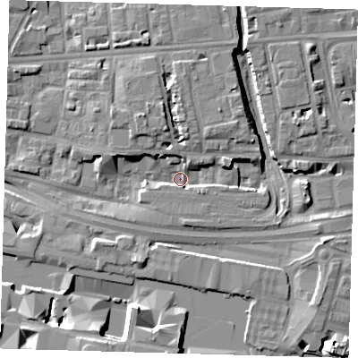Shaded relief map of the ground around E140AJ, computed from Environment Agency LiDAR. The ground here sits at about 2 m above sea level and falls 12 m across the surrounding 800 m. Surface water reaching this point runs off ground lying to the north-north-west, 6.1 m higher.