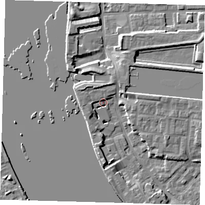 Shaded relief map of the ground around E143AL, computed from Environment Agency LiDAR. The ground here sits at about 3 m above sea level and falls 7 m across the surrounding 800 m. Surface water reaching this point runs off ground lying to the west, 5.6 m higher.