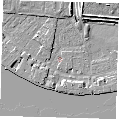 Shaded relief map of the ground around E143AT, computed from Environment Agency LiDAR. The ground here sits at about 2 m above sea level and falls 10 m across the surrounding 800 m. Surface water reaching this point runs off ground lying to the south-south-west, 6.8 m higher.