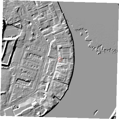 Shaded relief map of the ground around E143AZ, computed from Environment Agency LiDAR. The ground here sits at about 5 m above sea level and falls 10 m across the surrounding 800 m. Surface water reaching this point runs off ground lying to the east-north-east, 3.4 m higher.