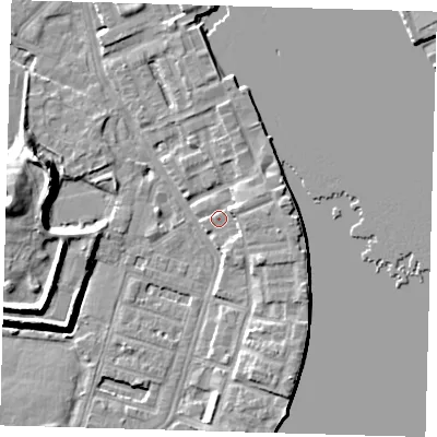 Shaded relief map of the ground around E143DU, computed from Environment Agency LiDAR. The ground here sits at about 4 m above sea level and falls 12 m across the surrounding 800 m. Surface water reaching this point runs off ground lying to the east-north-east, 3.5 m higher.