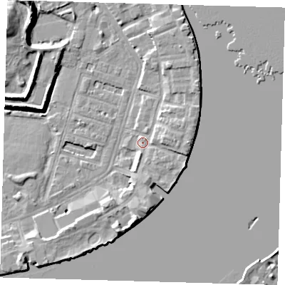 Shaded relief map of the ground around E143EB, computed from Environment Agency LiDAR. The ground here sits at about 4 m above sea level and falls 12 m across the surrounding 800 m. Surface water reaching this point runs off ground lying to the east, 4.3 m higher.