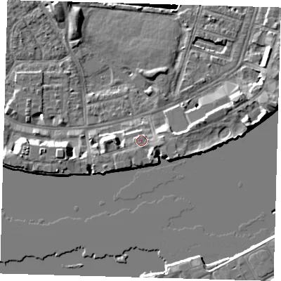 Shaded relief map of the ground around E143EP, computed from Environment Agency LiDAR. The ground here sits at about 5 m above sea level and falls 8 m across the surrounding 800 m. Surface water reaching this point runs off ground lying to the south-east, 2.0 m higher.