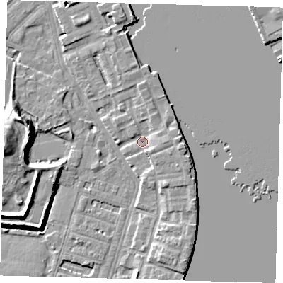 Shaded relief map of the ground around E143GB, computed from Environment Agency LiDAR. The ground here sits at about 3 m above sea level and falls 12 m across the surrounding 800 m. Surface water reaching this point runs off ground lying to the east, 3.7 m higher.