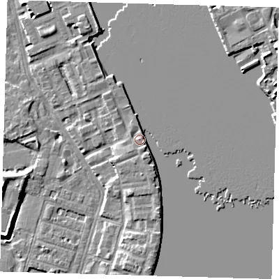 Shaded relief map of the ground around E143GE, computed from Environment Agency LiDAR. The ground here sits at about 5 m above sea level and falls 11 m across the surrounding 800 m. Surface water reaching this point runs off ground lying to the south, 4.0 m higher.