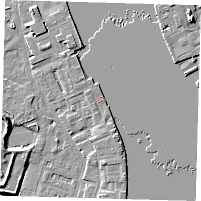 Shaded relief map of the ground around E143GH, computed from Environment Agency LiDAR. The ground here sits at about 5 m above sea level and falls 10 m across the surrounding 800 m. Surface water reaching this point runs off ground lying to the south, 1.8 m higher.