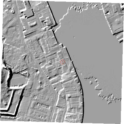 Shaded relief map of the ground around E143GJ, computed from Environment Agency LiDAR. The ground here sits at about 5 m above sea level and falls 11 m across the surrounding 800 m. Surface water reaching this point runs off ground lying to the south-south-east, 1.8 m higher.