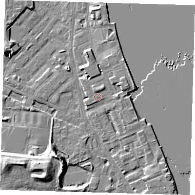 Shaded relief map of the ground around E143HD, computed from Environment Agency LiDAR. The ground here sits at about 4 m above sea level and falls 12 m across the surrounding 800 m. Surface water reaching this point runs off ground lying to the north-north-west, 1.3 m higher.