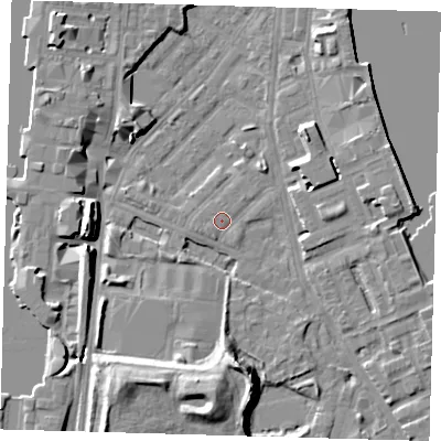Shaded relief map of the ground around E143HQ, computed from Environment Agency LiDAR. The ground here sits at about 2 m above sea level and falls 12 m across the surrounding 800 m. Surface water reaching this point runs off ground lying to the south, 12.1 m higher.
