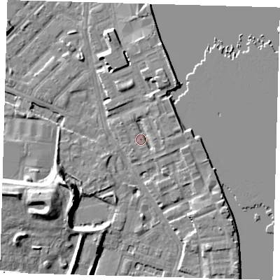 Shaded relief map of the ground around E143JA, computed from Environment Agency LiDAR. The ground here sits at about 4 m above sea level and falls 12 m across the surrounding 800 m. Surface water reaching this point runs off ground lying to the north-east, 3.1 m higher.