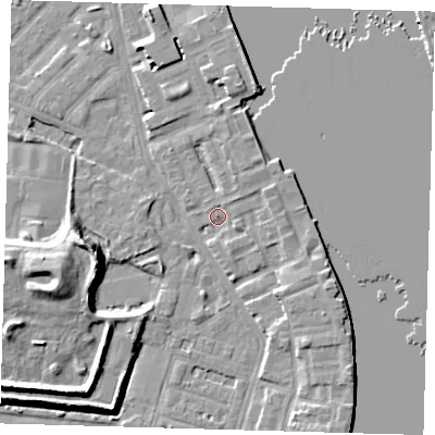 Shaded relief map of the ground around E143NL, computed from Environment Agency LiDAR. The ground here sits at about 3 m above sea level and falls 12 m across the surrounding 800 m. Surface water reaching this point runs off ground lying to the east-south-east, 3.6 m higher.