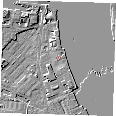 Shaded relief map of the ground around E143PR, computed from Environment Agency LiDAR. The ground here sits at about 4 m above sea level and falls 7 m across the surrounding 800 m. Surface water reaching this point runs off ground lying to the east-north-east, 2.3 m higher.