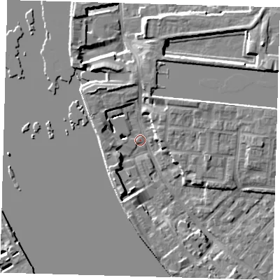 Shaded relief map of the ground around E143QA, computed from Environment Agency LiDAR. The ground here sits at about 2 m above sea level and falls 7 m across the surrounding 800 m. Surface water reaching this point runs off ground lying to the south-south-west, 5.4 m higher.