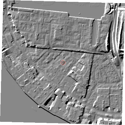 Shaded relief map of the ground around E143QU, computed from Environment Agency LiDAR. The ground here sits at about 2 m above sea level and falls 11 m across the surrounding 800 m. Surface water reaching this point runs off ground lying to the east-north-east, 3.0 m higher.