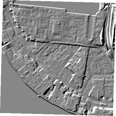 Shaded relief map of the ground around E143QY, computed from Environment Agency LiDAR. The ground here sits at about 2 m above sea level and falls 11 m across the surrounding 800 m. Surface water reaching this point runs off ground lying to the east-north-east, 2.9 m higher.