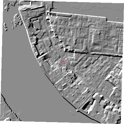 Shaded relief map of the ground around E143RR, computed from Environment Agency LiDAR. The ground here sits at about 2 m above sea level and falls 7 m across the surrounding 800 m. Surface water reaching this point runs off ground lying to the south, 5.0 m higher.