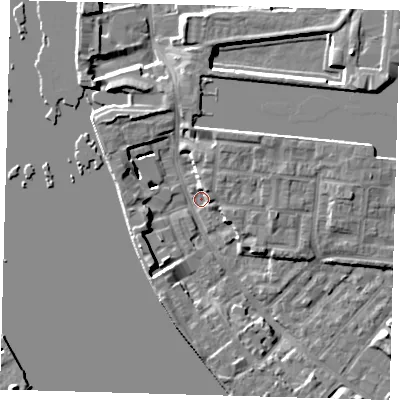 Shaded relief map of the ground around E143RS, computed from Environment Agency LiDAR. The ground here sits at about 1 m above sea level and falls 8 m across the surrounding 800 m. Surface water reaching this point runs off ground lying to the south-west, 6.4 m higher.