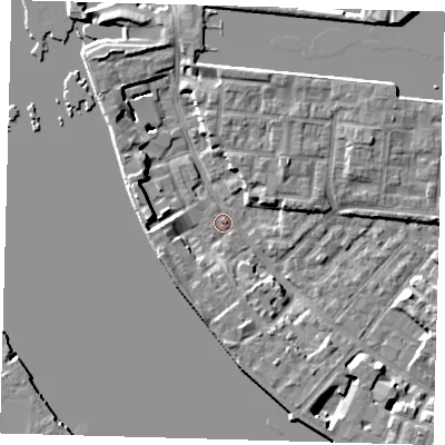Shaded relief map of the ground around E143RT, computed from Environment Agency LiDAR. The ground here sits at about 2 m above sea level and falls 7 m across the surrounding 800 m. Surface water reaching this point runs off ground lying to the south-south-east, 5.0 m higher.