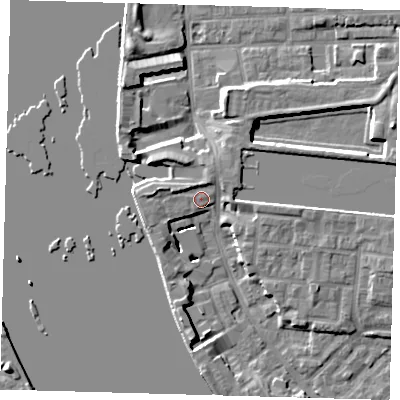 Shaded relief map of the ground around E143SB, computed from Environment Agency LiDAR. The ground here sits at about 4 m above sea level and falls 7 m across the surrounding 800 m. Surface water reaching this point runs off ground lying to the west-north-west, 2.1 m higher.