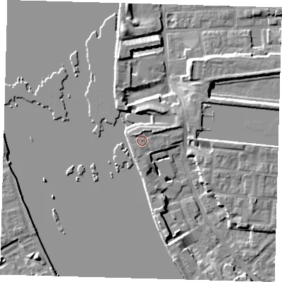 Shaded relief map of the ground around E143SD, computed from Environment Agency LiDAR. The ground here sits at about 5 m above sea level and falls 7 m across the surrounding 800 m. Surface water reaching this point runs off ground lying to the north-north-east, 1.6 m higher.