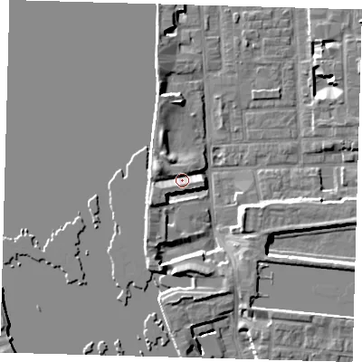 Shaded relief map of the ground around E143ST, computed from Environment Agency LiDAR. The ground here sits at about 5 m above sea level and falls 7 m across the surrounding 800 m. Surface water reaching this point runs off ground lying to the west-north-west, 3.7 m higher.