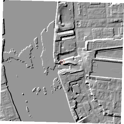 Shaded relief map of the ground around E143SY, computed from Environment Agency LiDAR. The ground here sits at about 4 m above sea level and falls 7 m across the surrounding 800 m. Surface water reaching this point runs off ground lying to the north, 4.5 m higher.