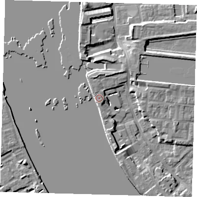 Shaded relief map of the ground around E143TT, computed from Environment Agency LiDAR. The ground here sits at about 5 m above sea level and falls 7 m across the surrounding 800 m. Surface water reaching this point runs off ground lying to the north, 3.3 m higher.
