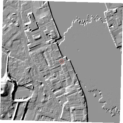 Shaded relief map of the ground around E143UZ, computed from Environment Agency LiDAR. The ground here sits at about 5 m above sea level and falls 12 m across the surrounding 800 m. Surface water reaching this point runs off ground lying to the north-north-east, 0.8 m higher.