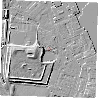 Shaded relief map of the ground around E143XD, computed from Environment Agency LiDAR. The ground here sits at about 3 m above sea level and falls 13 m across the surrounding 800 m. Surface water reaching this point runs off ground lying to the west-south-west, 12.0 m higher.