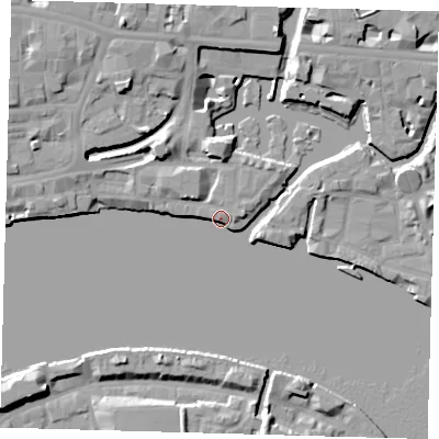 Shaded relief map of the ground around E148DJ, computed from Environment Agency LiDAR. The ground here sits at about 6 m above sea level and falls 12 m across the surrounding 800 m. Surface water reaching this point runs off ground lying to the north-north-west, 12.2 m higher.
