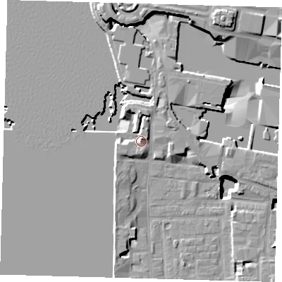 Shaded relief map of the ground around E148LA, computed from Environment Agency LiDAR. The ground here sits at about 5 m above sea level and falls 21 m across the surrounding 800 m. Surface water reaching this point runs off ground lying to the north, 3.7 m higher.
