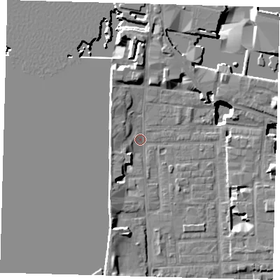 Shaded relief map of the ground around E148LU, computed from Environment Agency LiDAR. The ground here sits at about 3 m above sea level and falls 15 m across the surrounding 800 m. Surface water reaching this point runs off ground lying to the north, 4.4 m higher.