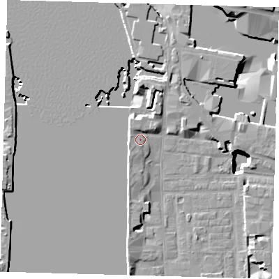 Shaded relief map of the ground around E148NG, computed from Environment Agency LiDAR. The ground here sits at about 4 m above sea level and falls 19 m across the surrounding 800 m. Surface water reaching this point runs off ground lying to the north, 2.3 m higher.