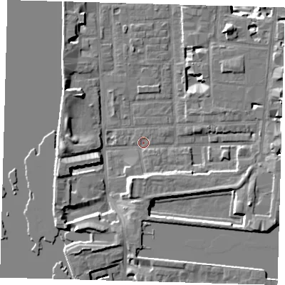 Shaded relief map of the ground around E148PZ, computed from Environment Agency LiDAR. The ground here sits at about 2 m above sea level and falls 9 m across the surrounding 800 m. Surface water reaching this point runs off ground lying to the east-north-east, 6.7 m higher.