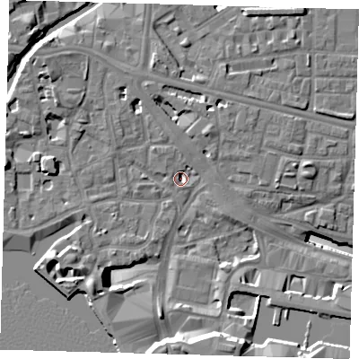 Shaded relief map of the ground around E148QG, computed from Environment Agency LiDAR. The ground here sits at about 2 m above sea level and falls 17 m across the surrounding 800 m. Surface water reaching this point runs off ground lying to the north, 6.4 m higher.