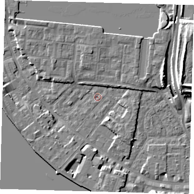 Shaded relief map of the ground around E148RQ, computed from Environment Agency LiDAR. The ground here sits at about 2 m above sea level and falls 13 m across the surrounding 800 m. Surface water reaching this point runs off ground lying to the east-north-east, 3.1 m higher.